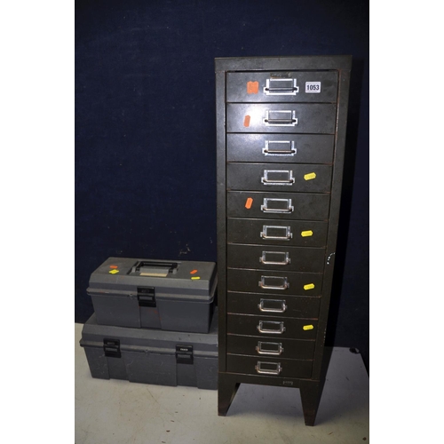 1053 - A NINE DRAW FILING CABINET containing miscellaneous items such as hooks, string, handles, pins etc. ... 