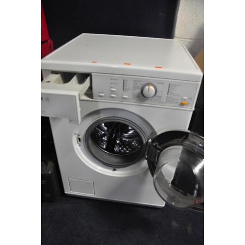 1059 - A MIELE W412 WASHING MACHINE measuring width 60cm x depth 60cm x height 85cm (PAT pass and powering ... 