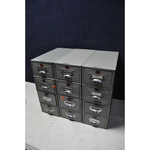 1084 - A SET OF VETERAN SERIES FILING DRAWS comprising twelve stackable filing draws/cabinets