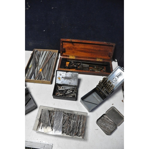 1092 - A LARGE COLLECTION OF DRILL BITS along with a small tray of saw blades, cased combination square (no... 