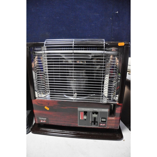 1095 - THREE VINTAGE PARAFINN HEATER comprising of two Toyokuni vario turbo heaters along with a Zibro kami... 