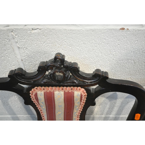 1218 - AN EARLY 20TH CENTURY MAHOGANY PARLOUR SUITE, with carved cresting rails, splat back and open armres... 