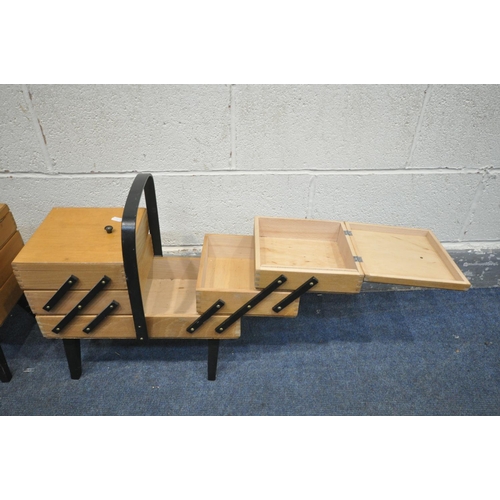 1229 - TWO BEECH CANTILEVER SEWING BOXES, one with sewing accessories (condition:-loose lid and water stain... 