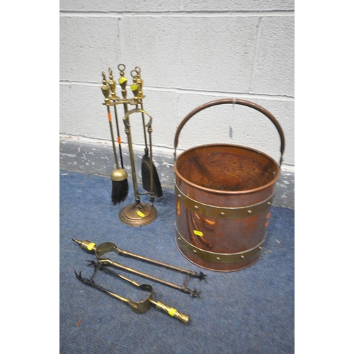 1232 - A COPPER AND BRASS COAL BUCKET, a brass companion set, copper warming pan and two spare forks (5)