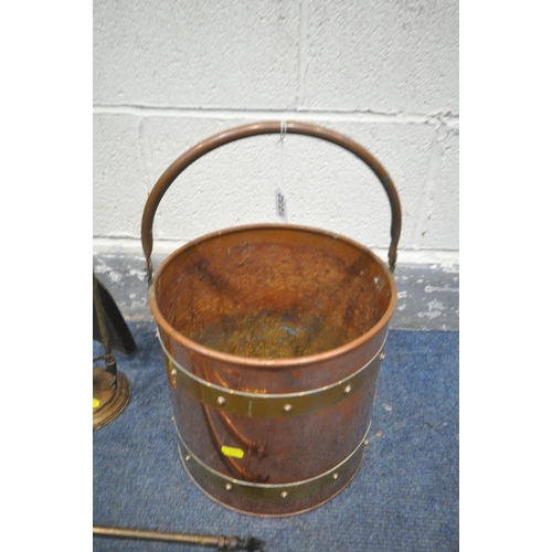 1232 - A COPPER AND BRASS COAL BUCKET, a brass companion set, copper warming pan and two spare forks (5)