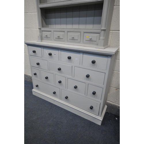 1242 - A GREY PAINTED NARROW CHEST OF FOURTEEN DRAWERS, width 122cm x depth 28cm x 90cm, and a painted dres... 