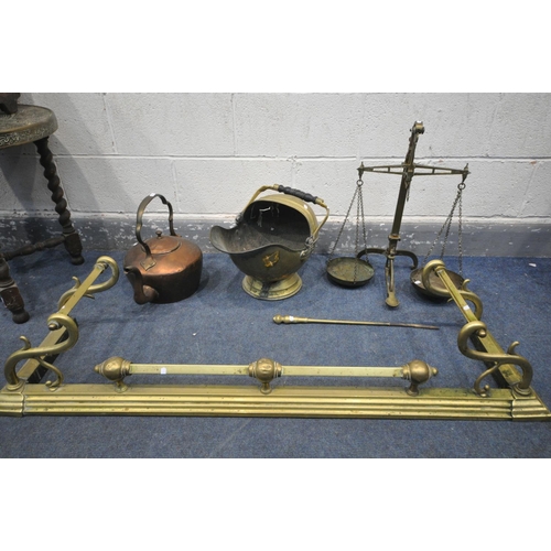 1246 - A VICTORIAN BRASS FENDER, length 134cm, a brass balance scale, a brass coal scuttle, a copper kettle... 