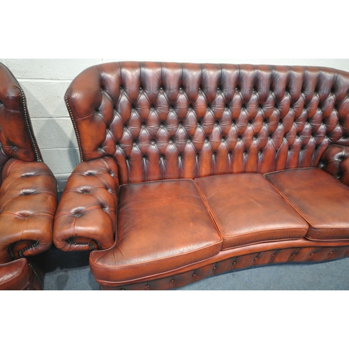 1259 - AN OXBLOOD THREE PIECE CHESTERFIELD SUITE, comprising a three seater sofa, length 202cm, and a pair ... 