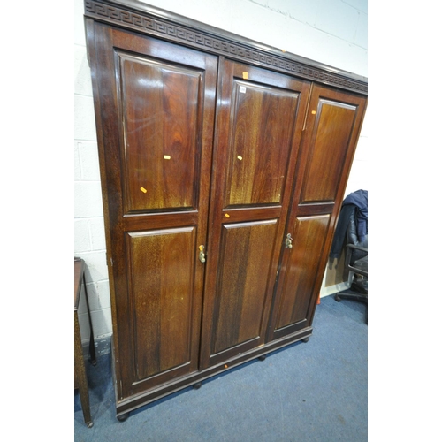 1265 - AN EDWARDIAN WALNUT BEDROOM SUITE, comprising a triple door wardrobe, width 150cm x depth 53cm x hei... 