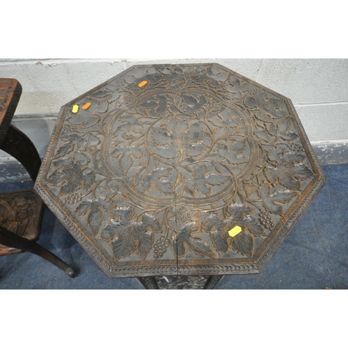 1269 - AN ANGLO INDIAN CARVED HARDWOOD OCTAGONAL FOLDING OCCASIONAL TABLE, with open fretwork detail, 61cm ... 