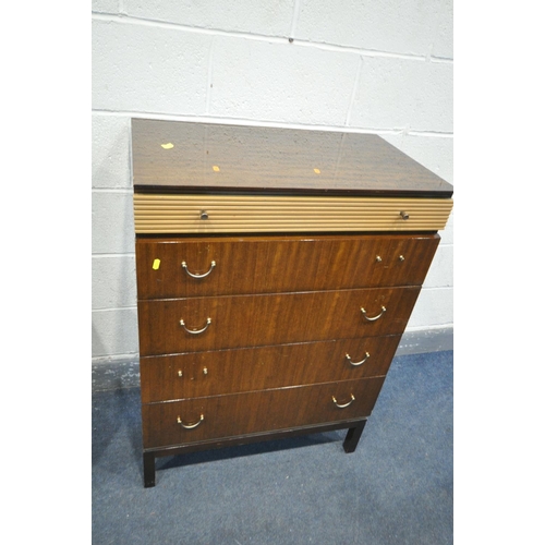 1284 - A MID CENTURY GOLDEN KEY TEAK FINISH BEDROOM SUITE, comprising a dressing table, and a tall chest of... 