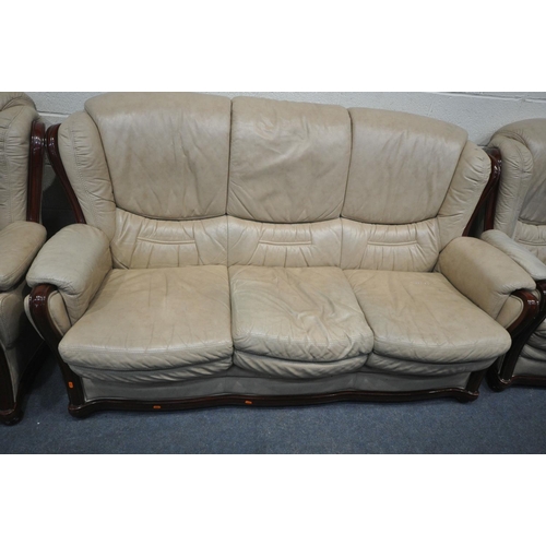 1288 - A CREAM LEATHER THREE PIECE LOUNGE SUITE, comprising a three seater sofa, length 182cm, a two seater... 