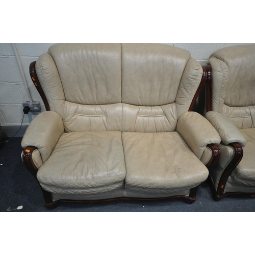 1288 - A CREAM LEATHER THREE PIECE LOUNGE SUITE, comprising a three seater sofa, length 182cm, a two seater... 