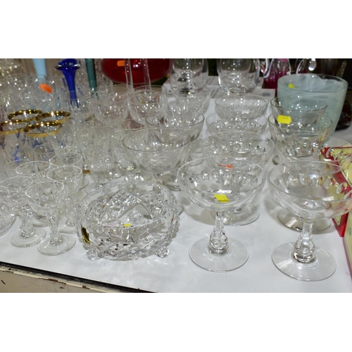 445 - A COLLECTION OF CUT CRYSTAL AND COLOURED ART GLASS, comprising a Murano clear to cranberry controlle... 