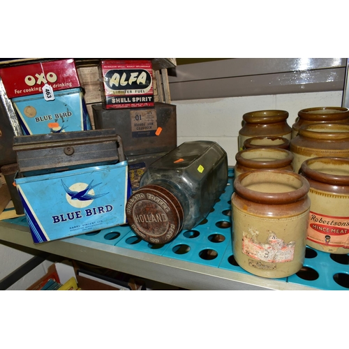 463 - A COLLECTION OF VINTAGE ADVERTISING TINS AND PACKAGING, to include a glass Holland Toffee jar with a... 