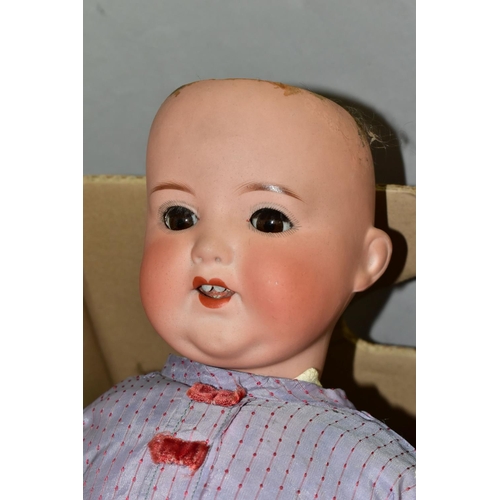 492 - A TREBOR BISQUE HEAD DOLL, nape of neck marked 'Trebor Germany 22.', sticking sleeping eyes with pai... 