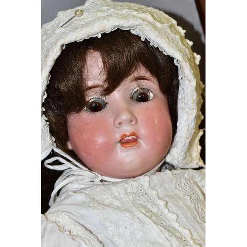 492 - A TREBOR BISQUE HEAD DOLL, nape of neck marked 'Trebor Germany 22.', sticking sleeping eyes with pai... 