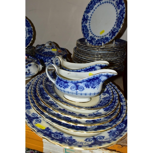 531 - T. RATHBONE & Co FLOW BLUE OSBORNE PATTERN PART DINNER SERVICE, comprising five graduated platters, ... 