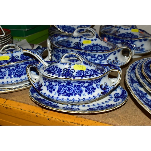 531 - T. RATHBONE & Co FLOW BLUE OSBORNE PATTERN PART DINNER SERVICE, comprising five graduated platters, ... 