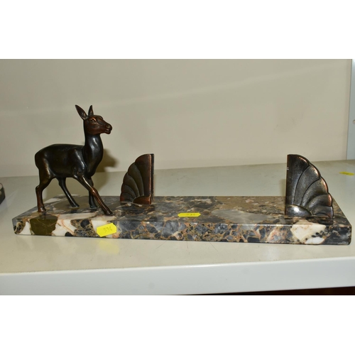 534 - A FRENCH ART DECO SCULPTURE OF TWO DEER, one lying one standing, mounted to a marble base, approxima... 