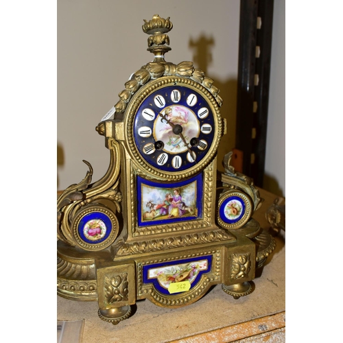 542 - A FRENCH STYLE GILT METAL CHIMING MANTLE CLOCK, hand painted porcelain dial and inset plaques, appro... 