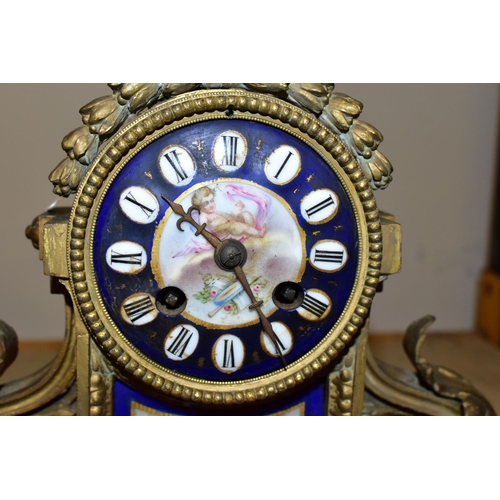 542 - A FRENCH STYLE GILT METAL CHIMING MANTLE CLOCK, hand painted porcelain dial and inset plaques, appro... 