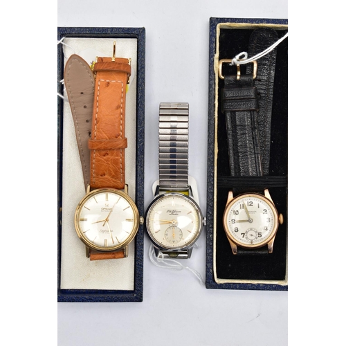 1097A - THREE GENTS WRISTWATCHES, to include a yellow metal Omega Automatic, round champagne dial signed 'Om... 