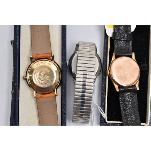 1097A - THREE GENTS WRISTWATCHES, to include a yellow metal Omega Automatic, round champagne dial signed 'Om... 