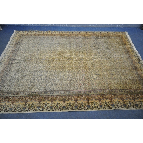 1197 - A 20TH CENTURY WOLLEN PERSIAN MOOD CARPET, with a repeating design and foliate border, 290cm x 196cm... 