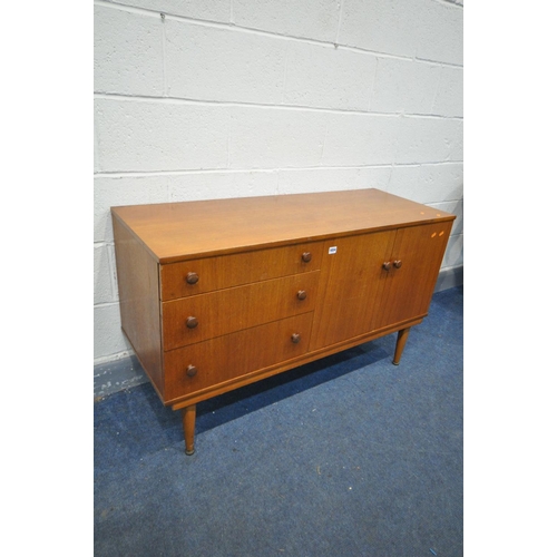 1198 - A MID-CENTURY TEAK SIDEBOARD, with three graduated drawers, besides double cupboard doors, width 122... 