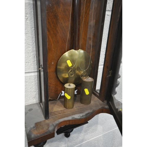 1199 - A LATE 19TH CENTURY WALNUT VIENNA WALL CLOCK, half turned fluted pillars to the door, enclosing an e... 