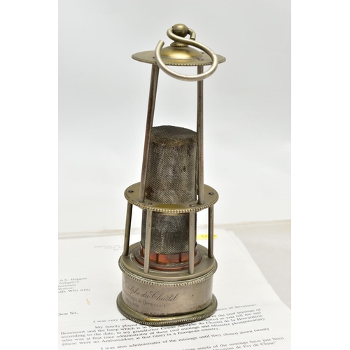 1205A - AN EARLY 20TH CENTURY BRASS, COPPER AND PEWTER BELGIAN MINERS LAMP, fitted with a hanging hook, bead... 