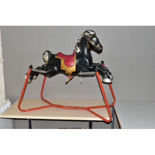 1235A - A 1960'S METAL ROCKING HORSE ON A SPRUNG FRAME, possibly by Mobo, height 90cm x length 101cm (Condit... 