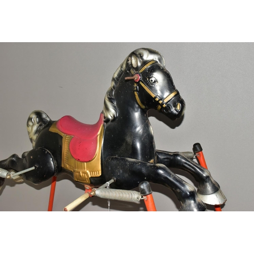 1235A - A 1960'S METAL ROCKING HORSE ON A SPRUNG FRAME, possibly by Mobo, height 90cm x length 101cm (Condit... 