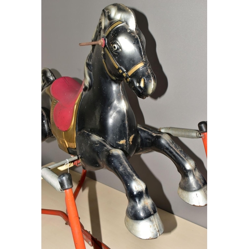 1235A - A 1960'S METAL ROCKING HORSE ON A SPRUNG FRAME, possibly by Mobo, height 90cm x length 101cm (Condit... 