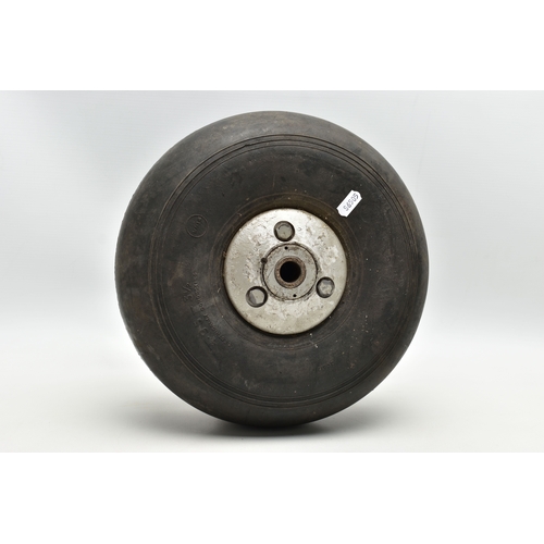 1057A - A WWII AIRCRAFT PNEUMATIC WHEEL, PROBABLY FROM A HAURRICANE OR SPITFIRE, the black rubber marked '4.... 