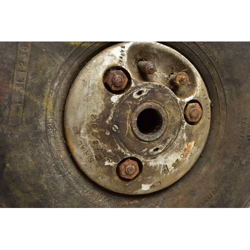 1057A - A WWII AIRCRAFT PNEUMATIC WHEEL, PROBABLY FROM A HAURRICANE OR SPITFIRE, the black rubber marked '4.... 