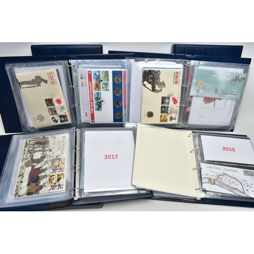 113 - FOUR ROYAL MAIL/ROYAL MINT PHILATELIC NUMISMATIC  ALBUMS, to include from 1995 through to 2019,1992 ... 