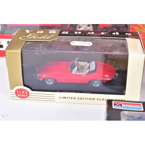 31 - A BOXED DANBURY MINT 1949 JAGUAR XK120, 1/24 scale, missing mirrors and has some yellowing to whitew... 