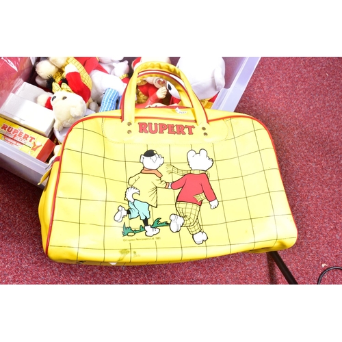 32 - A COLLECTION OF RUPERT THE BEAR AND FRIENDS SOFT TOYS AND COLLECTIBLES, to include a Holdall, assort... 