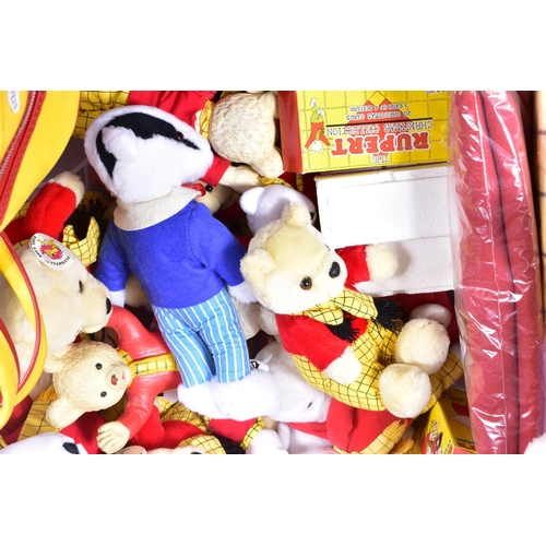 32 - A COLLECTION OF RUPERT THE BEAR AND FRIENDS SOFT TOYS AND COLLECTIBLES, to include a Holdall, assort... 