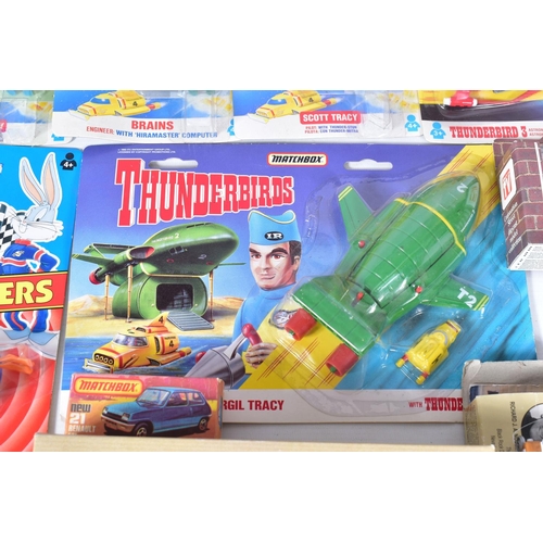 33 - A QUANTITY OF BOXED MODERN DIECAST VEHICLES, to include Matchbox Thunderbirds and Stingray items all... 