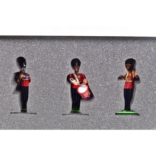 113 - A QUANTITY OF BRITAINS SCOTS GUARDS BAND FIGURE SETS, from the Collectors Club Centenary Series Quee... 