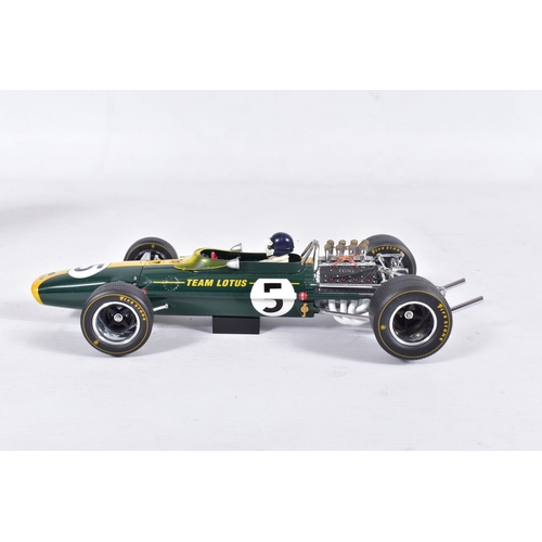 144 - A BOXED EXOTO 1/18 SCALE GRAND PRIX CLASSICS LOTUS FORD TYPE 49, green with RN5, appears complete an... 