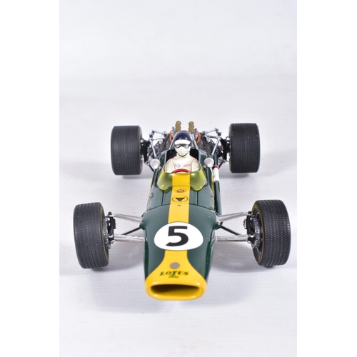 144 - A BOXED EXOTO 1/18 SCALE GRAND PRIX CLASSICS LOTUS FORD TYPE 49, green with RN5, appears complete an... 