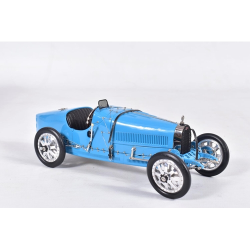 147 - A BOXED CMC 1/18 SCALE 1924 BUGATTI TYPE 35 GRAND PRIX CAR, No.M-063, complete and in very good cond... 