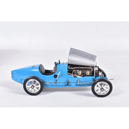 147 - A BOXED CMC 1/18 SCALE 1924 BUGATTI TYPE 35 GRAND PRIX CAR, No.M-063, complete and in very good cond... 