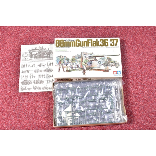 173 - A QUANTITY OF BOXED UNBUILT ASSORTED MILITARY PLASTIC CONSTRUCTION KITS, mixture of Airfix, Tamiya, ... 