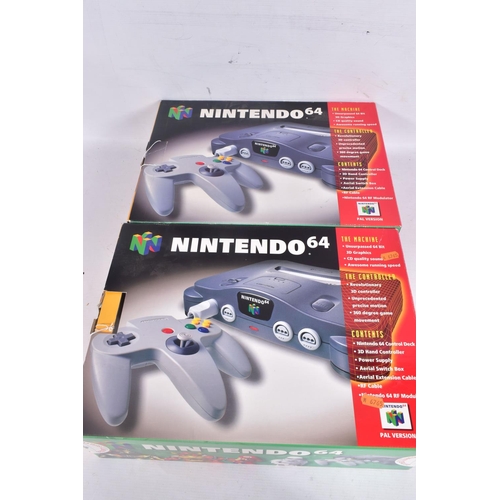 209 - TWO BOXED NINTENDO 64 CONSOLES, CONTROLLERS AND A QUANTITY OF GAMES, N64s that are boxed are not the... 