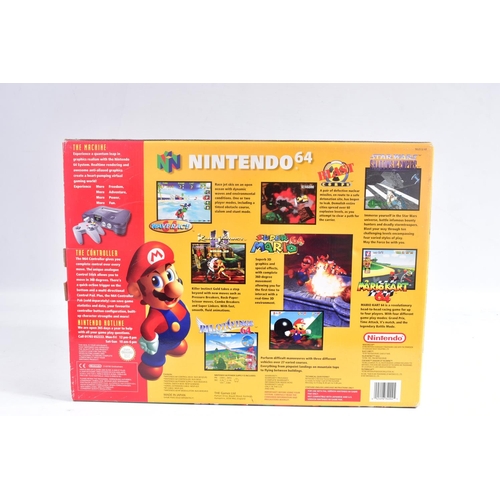 209 - TWO BOXED NINTENDO 64 CONSOLES, CONTROLLERS AND A QUANTITY OF GAMES, N64s that are boxed are not the... 